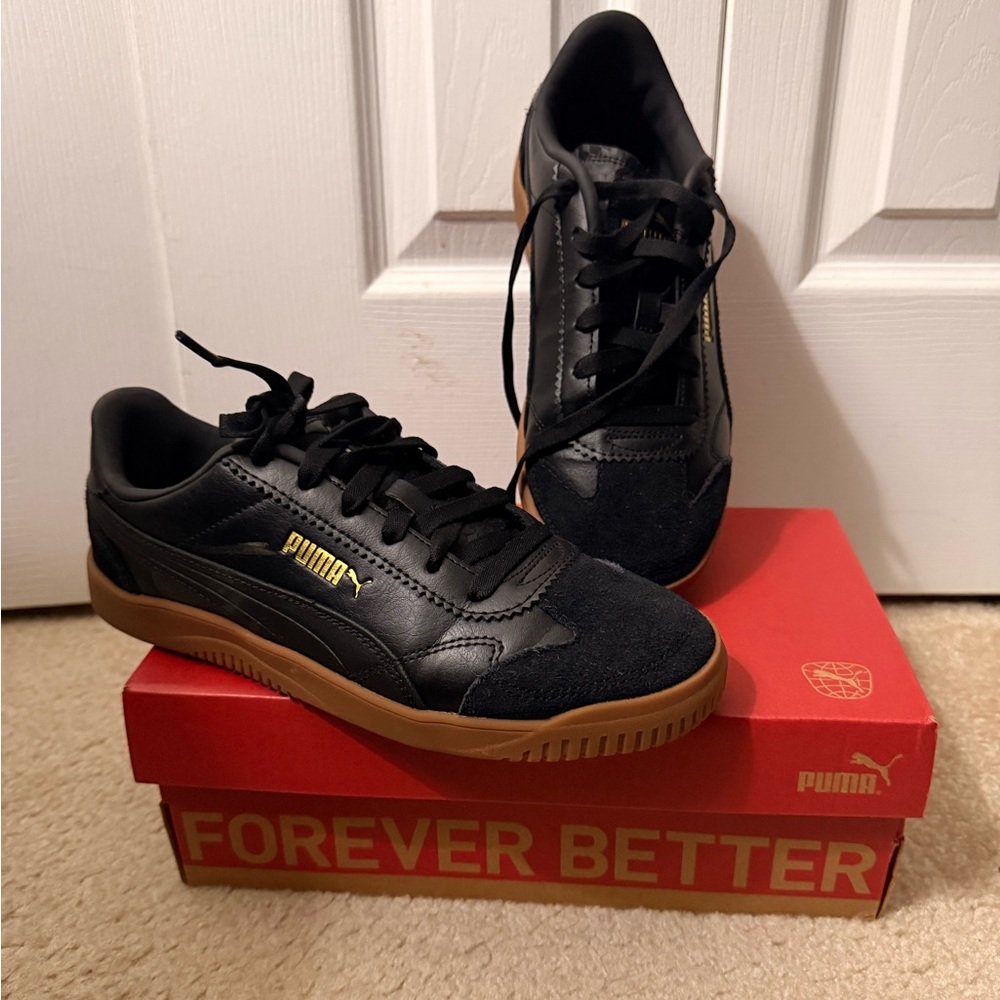 Puma Black and Gold Athletic Shoes